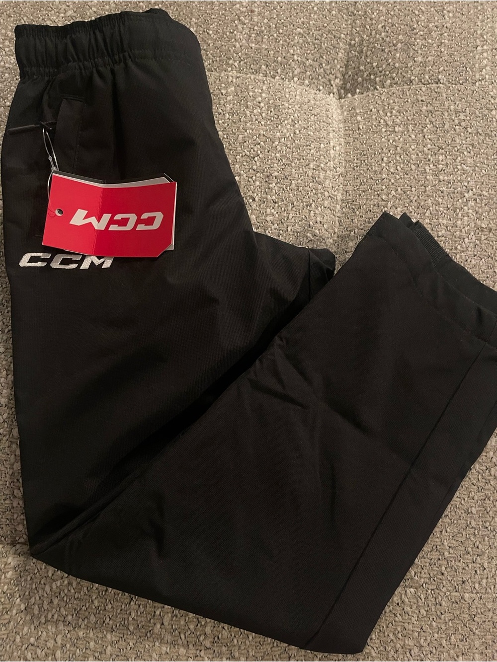 CCM Black Kids Sweatpants with Red Tag